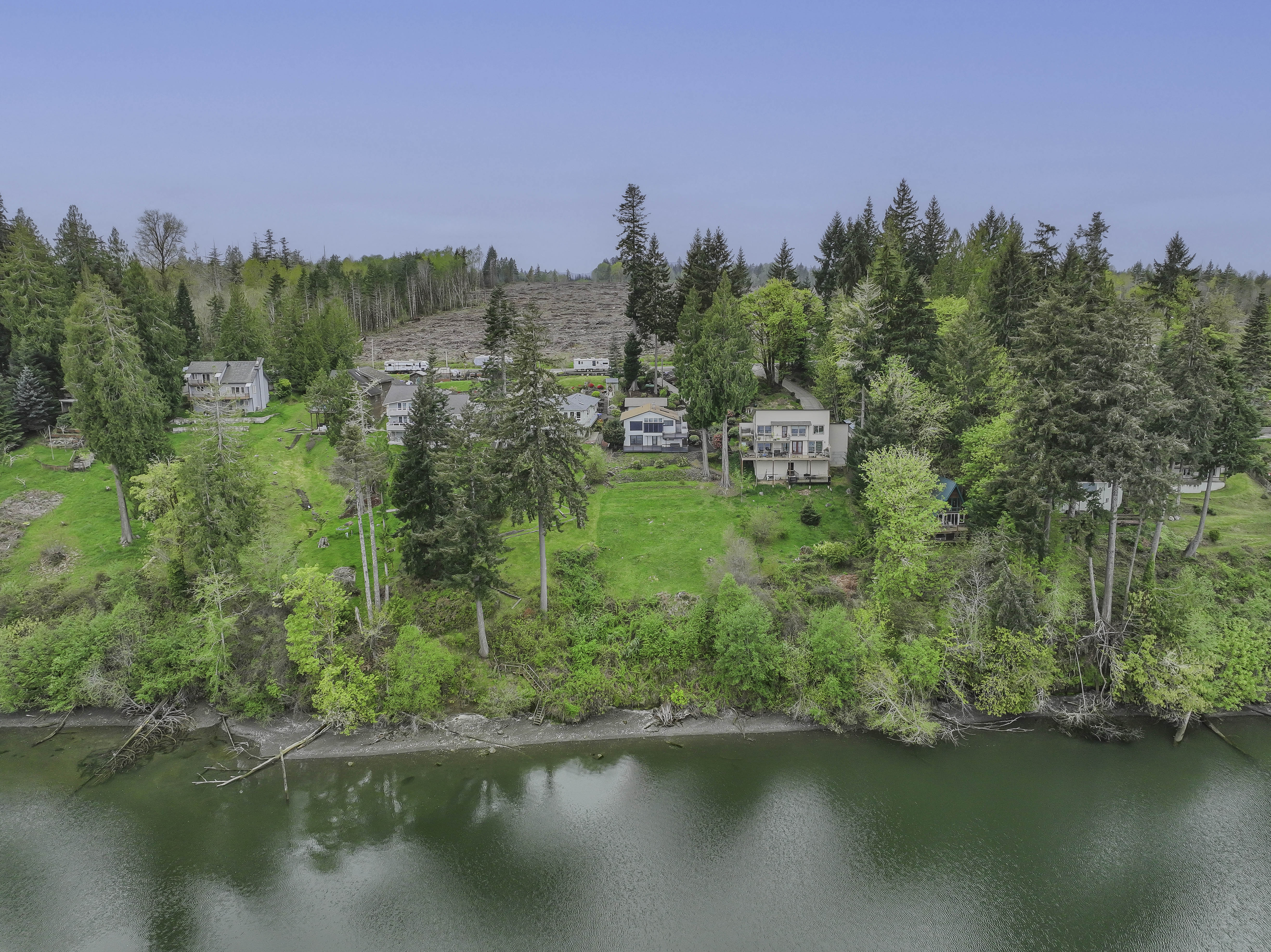 Drone aerial of Kamilche Shores waterfront property and Totten Inlet